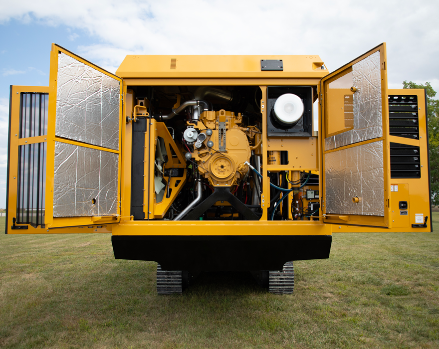 The open hatch of a Vermeer low speed shredder showing how operators access important maintenance features