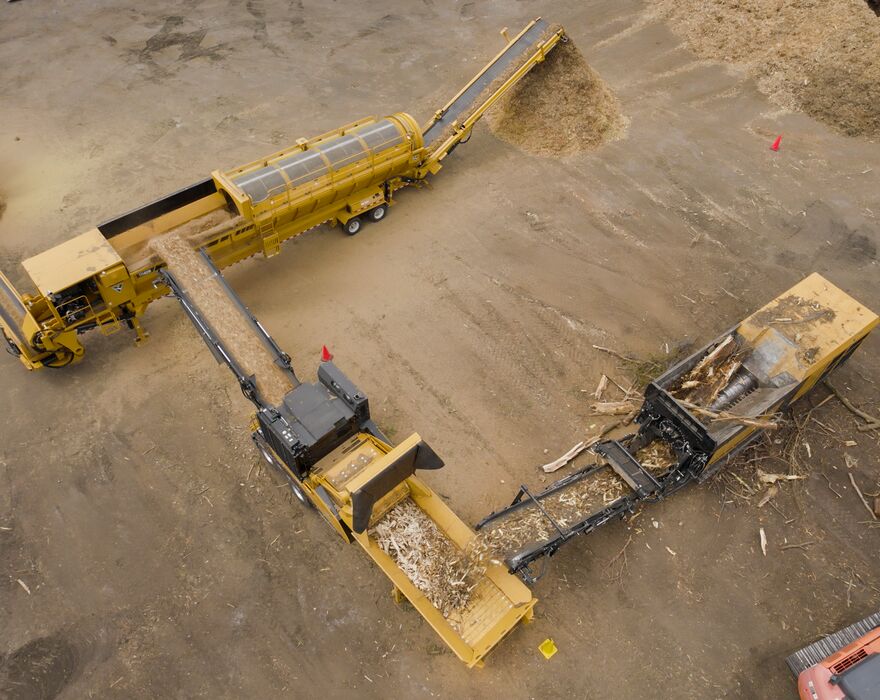 An aerial shot of shredders and grinders processing wood waste