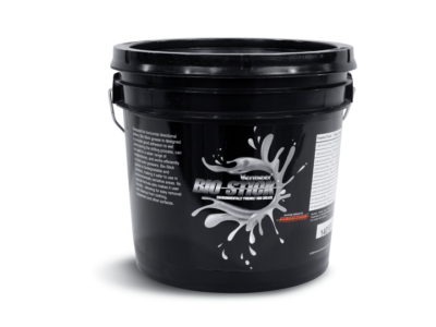 A black bucket with a label that says "Vermeer Bio-Stick; Environmentally Friendly HDD Grease"