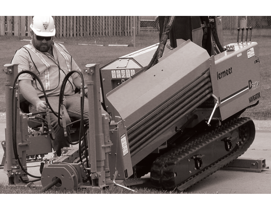 Black and white photo on a man on a d7 directional drill