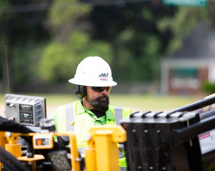 Automated rod exchange (ARE) being used on a Vermeer horizontal directional drill